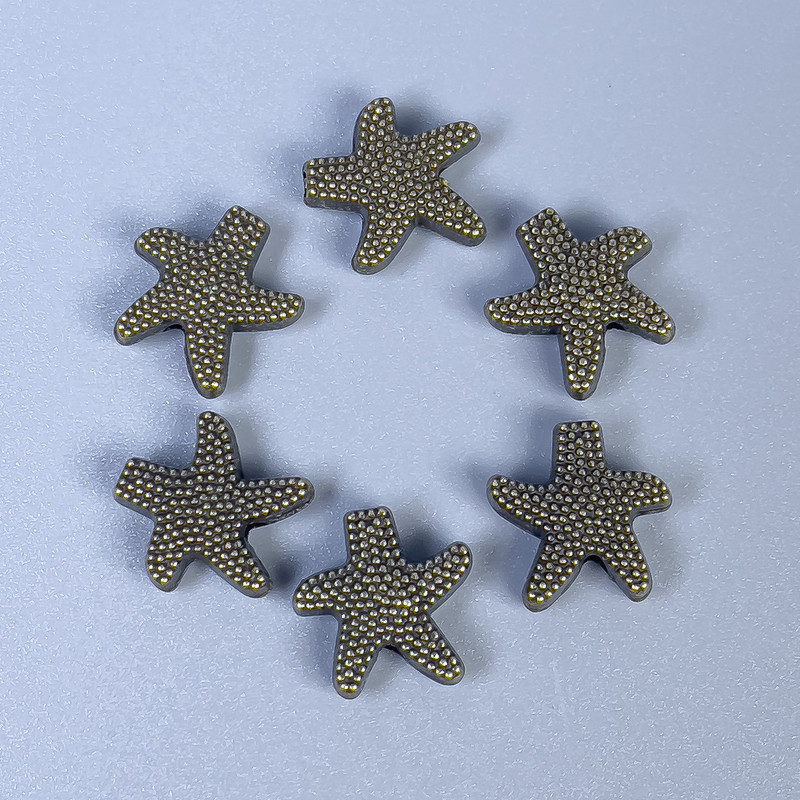 Koralik-wstawka Gwiazda morska, kolor metalu brązowy, średnica 10×3 mm ± otwór Ø 1,5 mm ± opakowanie 11 szt.