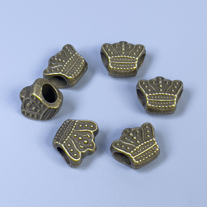 Koralik-wkładka 'Korona' w kolorze brązu, średnica 11×10×6 mm, otwór około 4 mm, opakowanie 11 szt.