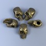 Koralik-wkładka do biżuterii w formie czaszki, kolor metalu: brąz, średnica 12×18×8 mm ± otwór, średnica 4 mm ± opakowanie 20 g (~5 szt.)