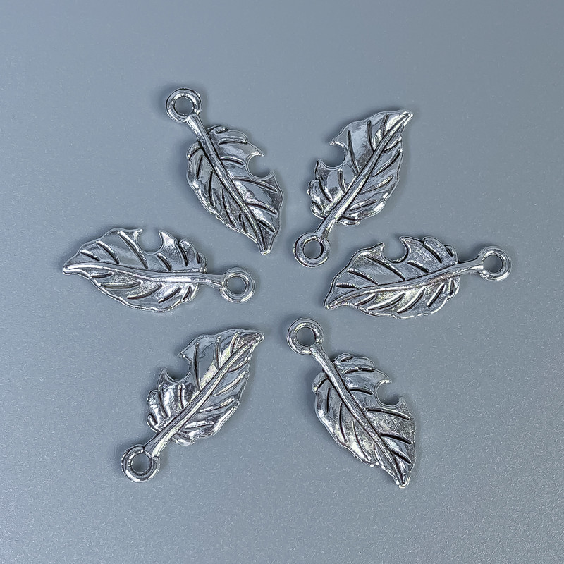 Zawieszka do biżuterii „Liść”, kolor metalu srebrny, wymiary 23×10×1 mm ± otwór, średnica 2 mm ± opakowanie 20 g (~26 szt.)