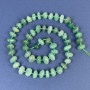 Koraliki z nefrytu fasetowane z drobnymi koralikami 10-12×6 mm ± na nitce, długość około 43 cm