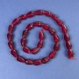 Koraliki z turmalinu w kształcie kropli 12x8–4 mm na nitce, długość 38 cm