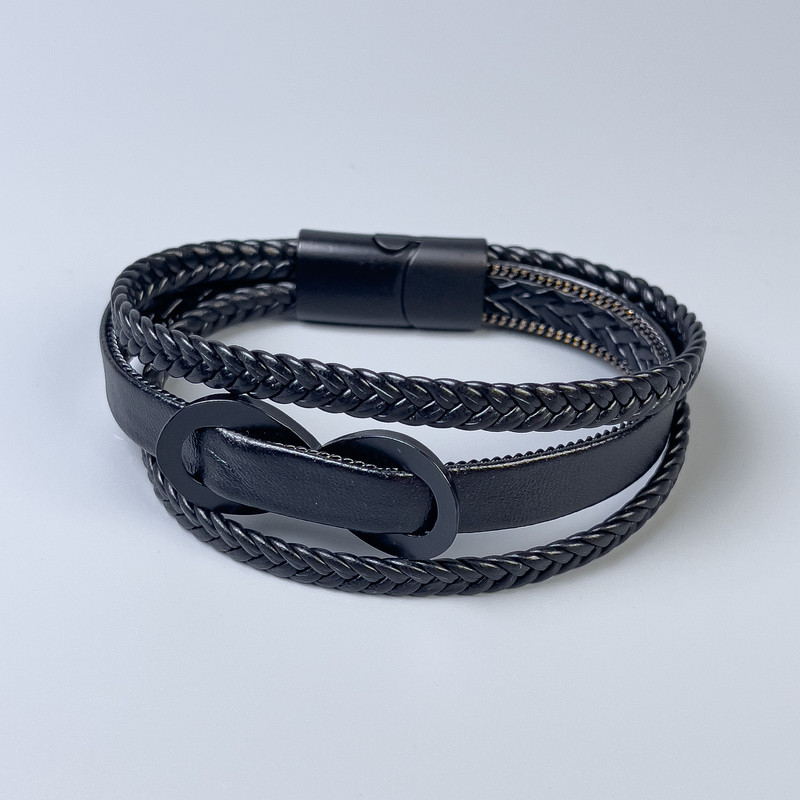 Bransoleta trzypasmowa męska z czarnej ekoskóry z metalową wstawką, grubość 12–25 mm, długość 22 cm, czarny metal na zapięciu