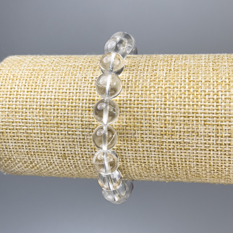 Bransoletka z górskiego kryształu, gładkie kuleczki, średnica około 10 mm, długość 18 cm, elastyczna