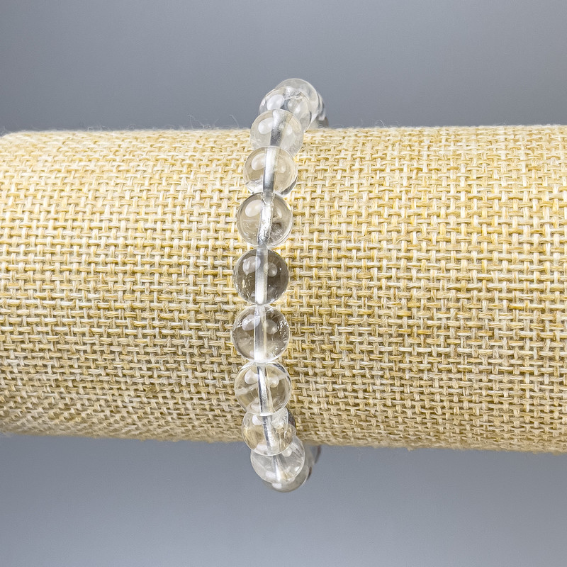 Bransoletka z górskiego kryształu, gładkie kuleczki, średnica 8 mm, długość 18 cm, elastyczna