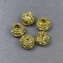 Koralik-wstawka o złocistym kolorze metalu, średnica 9×10 mm, otwór 5 mm, opakowanie 5 szt.