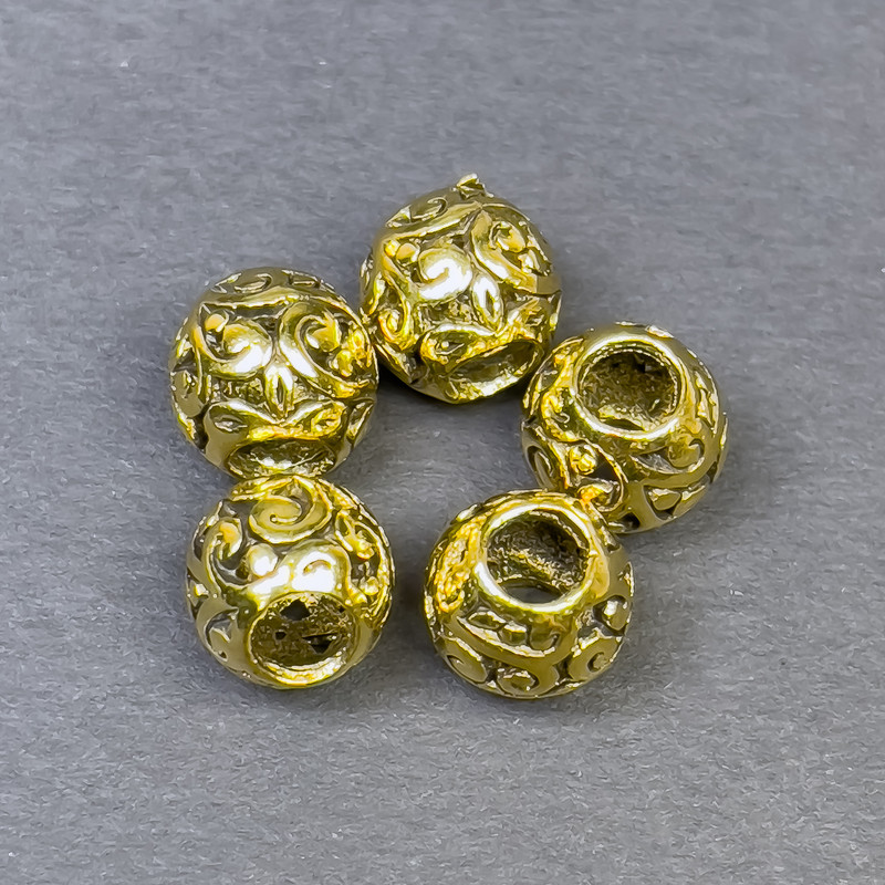 Koralik-wstawka w kolorze złotym, średnica 9×10 mm, otwór 4,5 mm, opakowanie 5 szt.