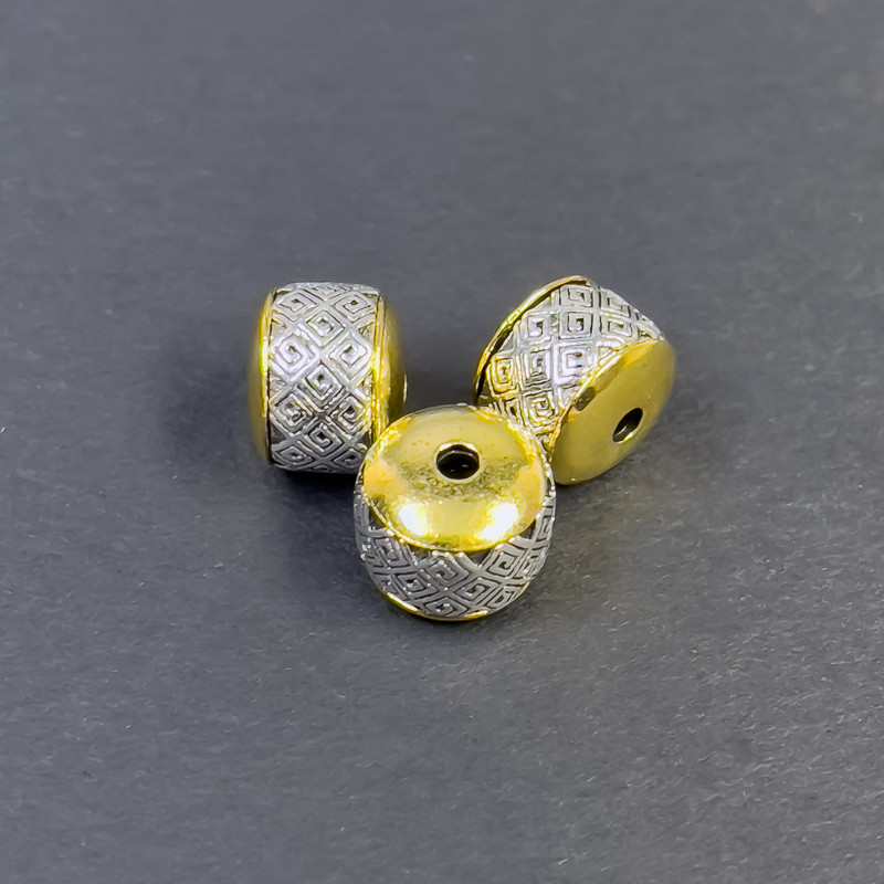 Koralik-wkładka, kolor metalu srebrzysto-złoty, średnica 8×10 mm, otwór 2 mm, opakowanie 3 szt.