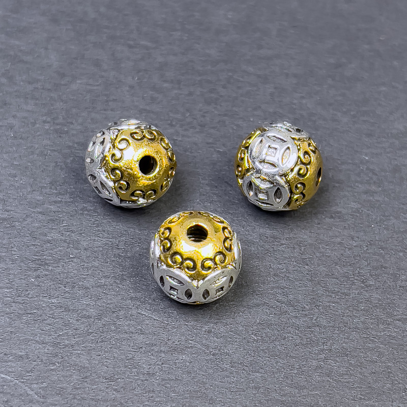 Koralik-wstawka, kolor metalu srebrzysto-złoty, średnica 10×10 mm ± otwór 2 mm ±, opakowanie 3 szt.