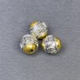 Koralik-wstawka w kolorze metalu srebrzysto-złotym, wymiary 10×9 mm, otwór około 2 mm, opakowanie 3 szt.