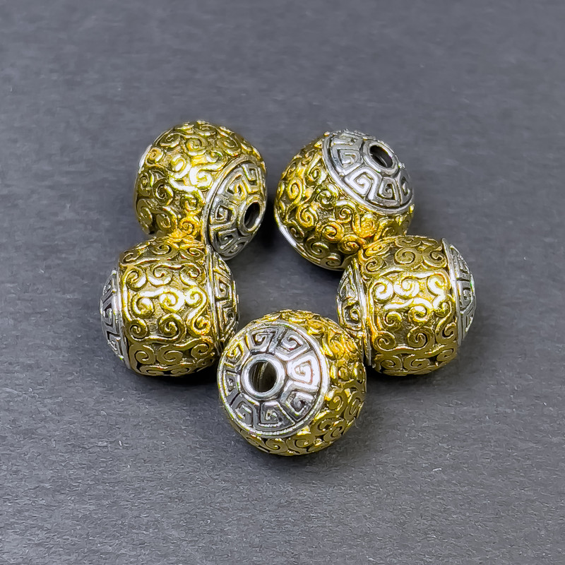 Koralik-wstawka do biżuterii w kolorze srebrzysto-złotym, średnica 11×11 mm ± otwór, średnica 2,5 mm ± cena za 1 szt.
