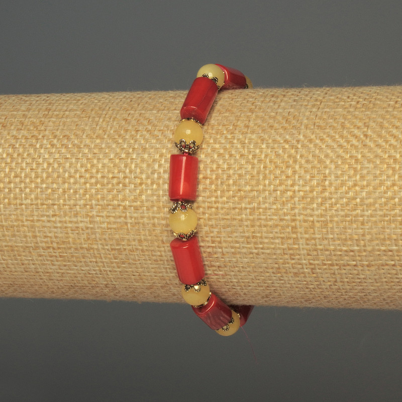Bransoletka z koralu cylindrycznego, średnica 12×6 mm +-, kuleczka cytrynu 6 mm +-, długość 18 cm +-, elastyczna