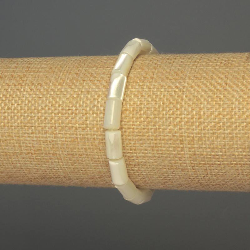 Bransoletka z masy perłowej o cylindrycznym kształcie, średnica 10×6 mm, długość 18 cm, elastyczna