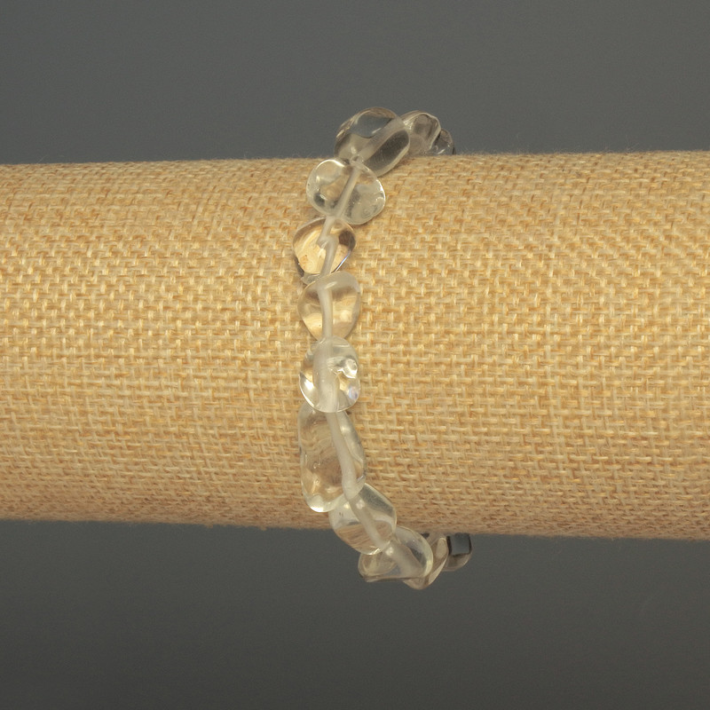 Bransoletka z górskiego kryształu fasetowana, średnica 8–12×9 mm ±, długość 18 cm ±, elastyczna