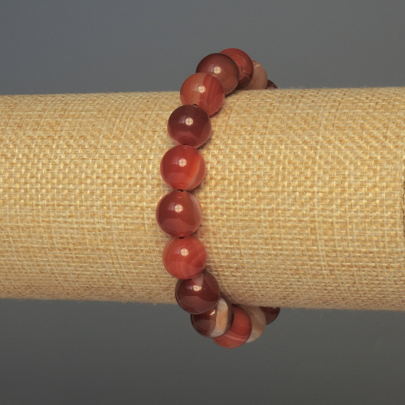 Bransoletka z agatu - gładkie kuleczki o średnicy 10 mm, długość około 18 cm, na elastycznej gumce