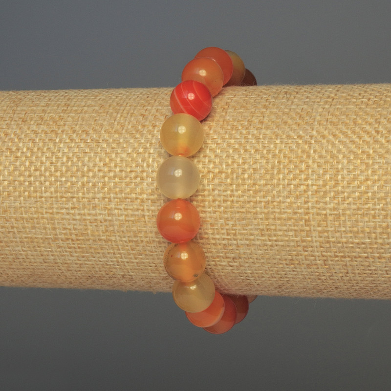 Bransoletka z karneolu, gładkie kuleczki, średnica 10 mm, długość 18 mm, elastyczna