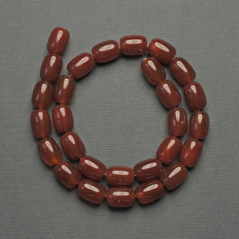 Koraliki karneol barilo, średnica 14×10 mm ±, na nici, długość 39 cm+