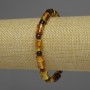 Bransoletka z bursztynu o cylindrycznych koralikach, średnica ok. 7×10 mm, kuleczki o średnicy 5 mm, długość 18 cm, elastyczna