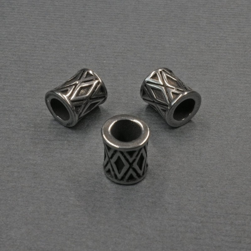 Koralik-wstawka w kolorze srebrzystym, średnica 7×8 mm, otwór ok. 4,5 mm