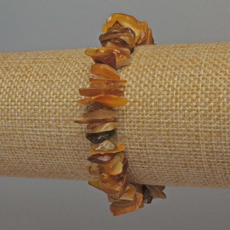 Bransoletka z bursztynowych drobin, średnica 9–14×3 mm, długość 18 cm, elastyczna