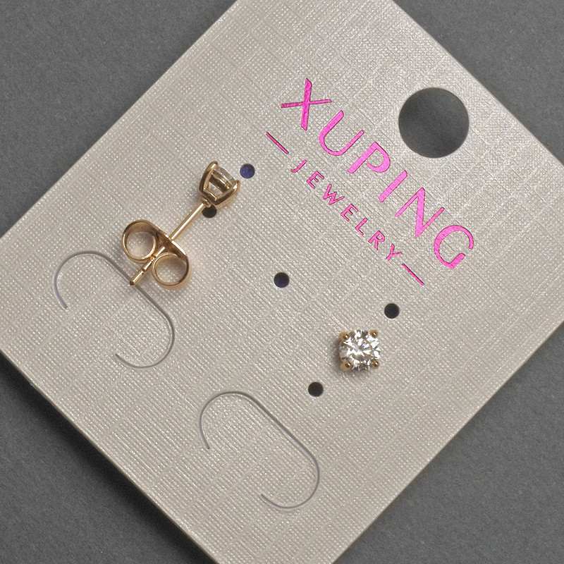 Kolczyki sztyfty Xuping z białymi cyrkoniami, średnica 4 mm, pozłacane 18K