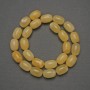 Koraliki żółtego agatu, naturalny kamień, w kształcie baryłek, średnica 14×10 mm ±, na żyłce, długość 39 cm+