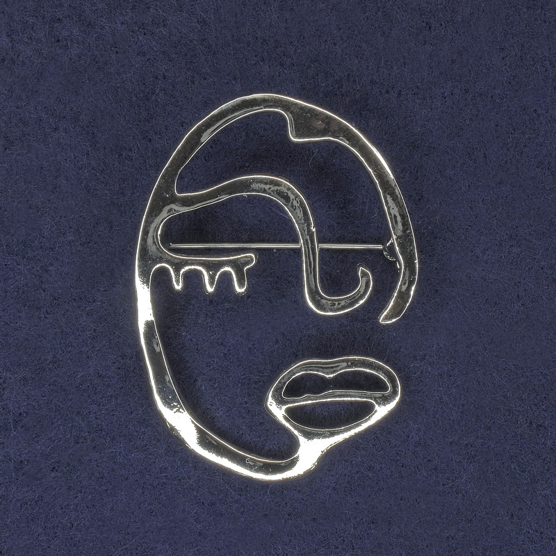 Broszka Akcent Twarz, kolor srebrny, 34×47 mm, metal srebrzysty