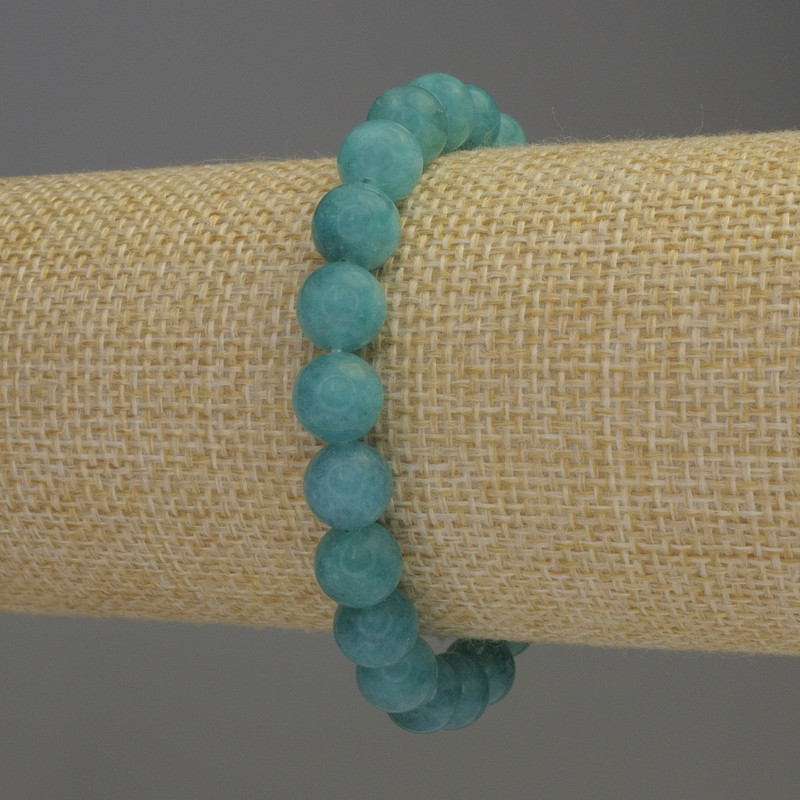 Bransoletka z akwamarynu — gładka kulka, średnica 8 mm +/-; długość 18 cm +/-; elastyczna