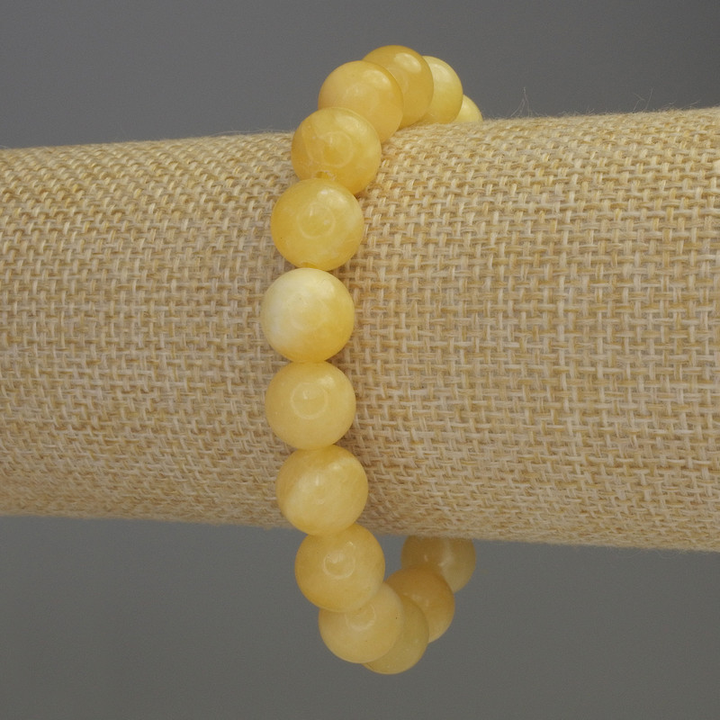 Bransoletka z żółtego agatu, gładkie kuleczki o średnicy 10 mm, długość 18 cm, elastyczna