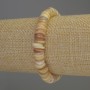Bransoletka z masy perłowej w rondelkowej formie, średnica ok. 8×2 mm, długość 18 cm, elastyczna