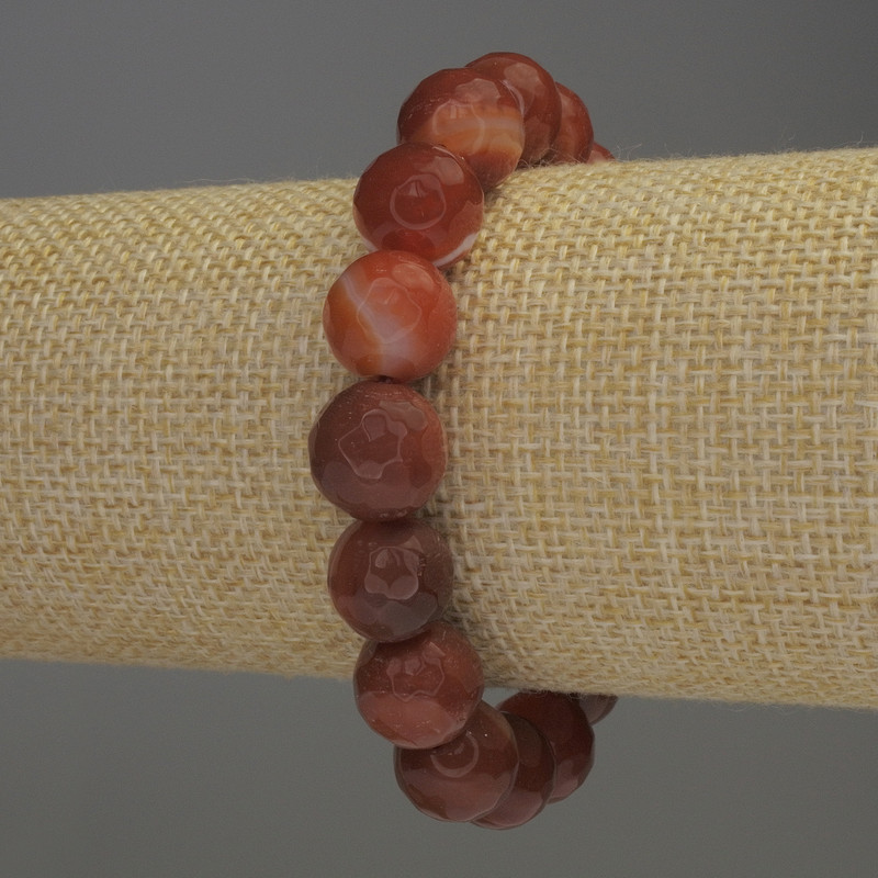 Bransoletka z karneolu, fasetowana kula, średnica 12 mm, długość 18 cm, elastyczna