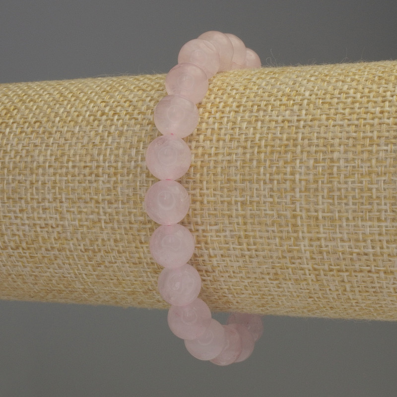 Bransoletka z różowego kwarcu, gładkie kulki o średnicy 8 mm, długość 18 cm, na gumce elastycznej