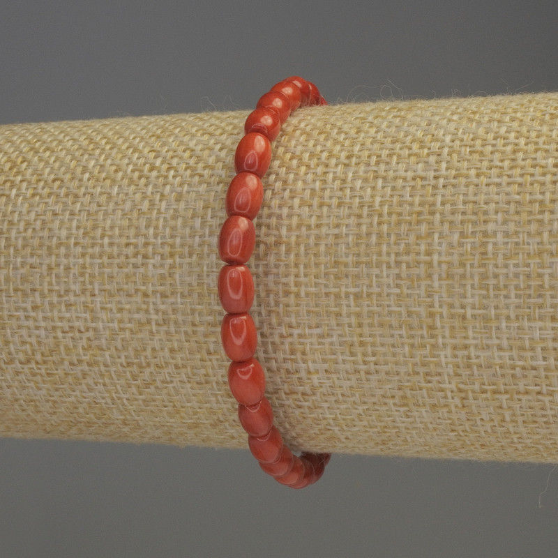 Bransoletka z pomarańczowego koralu baryłkowego, średnica 6×5 mm ±, długość 18 cm, elastyczna