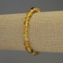 Bransoletka bursztynu — gładkie kuleczki, średnica 6–6,5 mm, długość 18 cm, elastyczna