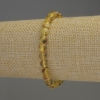 Bransoletka z bursztynu, gładkie kuleczki, średnica 6–6,5 mm, długość 18 cm, elastyczna
