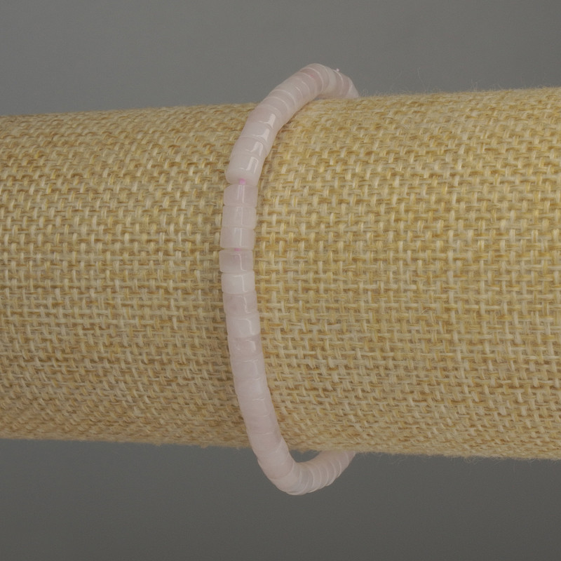 Bransoleta z różowego kwarcu, koraliki w kształcie rondeli o wymiarach 4,5 × 3 mm, długość 18 cm, na elastycznej gumce