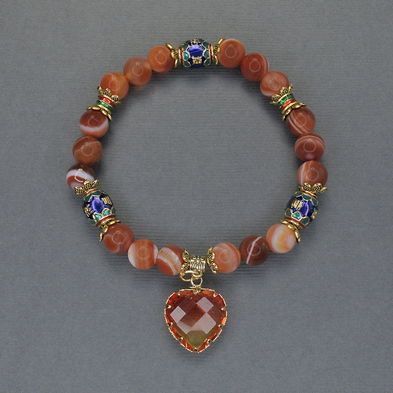 Bransoletka z pomarańczowego agatu, gładkie kuleczki o średnicy około 8 mm, elementy cloisonné 10×8 mm, długość 18 cm, elastyczna