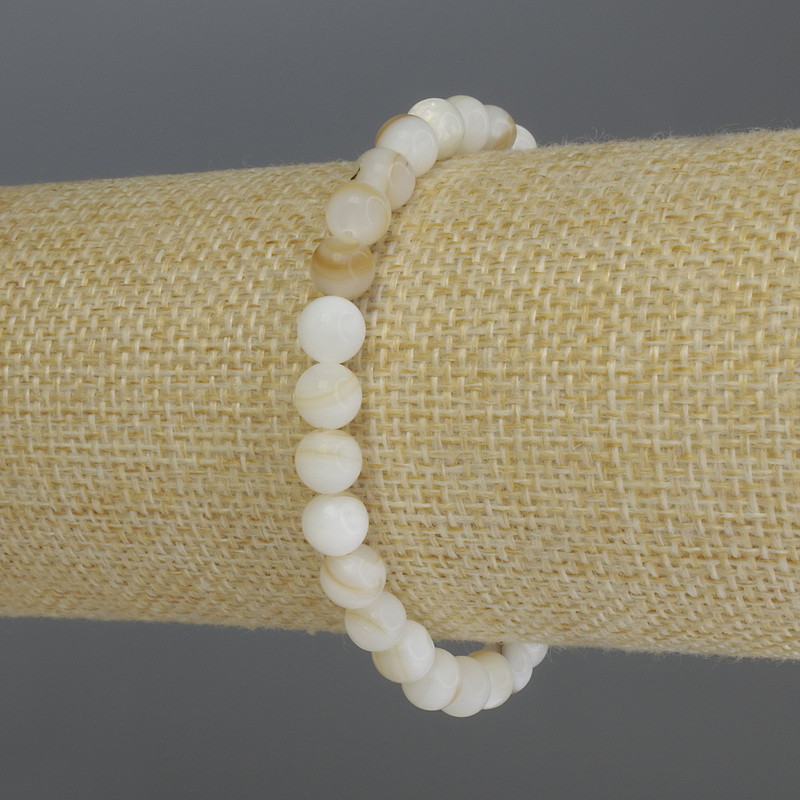 Bransoletka z masy perłowej, gładkie kulki 6 mm, długość 18 cm, elastyczna