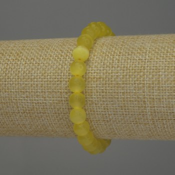 Bransoletka z żółtym kocim okiem, gładkie kulki, średnica około 8 mm, długość około 18 cm, na elastycznej gumce