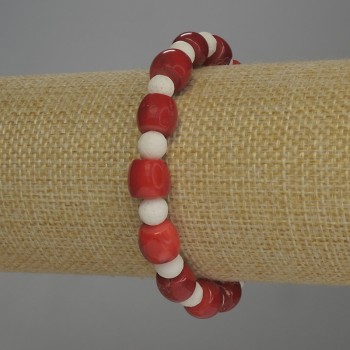 Bransoletka z koralu fasetowanego 9×7 mm ±, biały koral gąbczasty, kuleczka o średnicy 7 mm ±, długość 18 cm ±, na elastycznej gumce