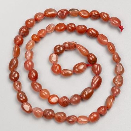 Koraliki z karneolu, polerowanie na nitce, średnica 8–10 mm × 6 mm +-, długość 40 cm+