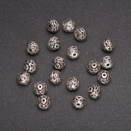 Koralik-wkładka, średnica 7 mm, średnica 1,4 mm, fasetowana, opakowanie 20 g, (+/-) 20 szt.