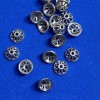 Srebrny kapeluszek do koralika, średnica 9×1 mm, otwór około 2 mm, opakowanie 20 g (~35 szt.)