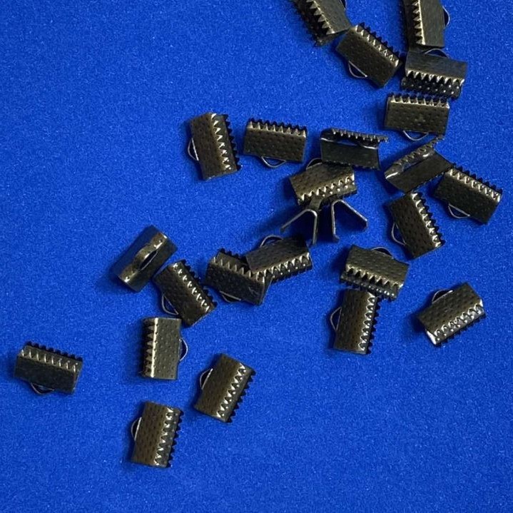 Koraliki zaciskowe do sznurków 10×7 mm, zestaw 80 szt. (±) 24 g
