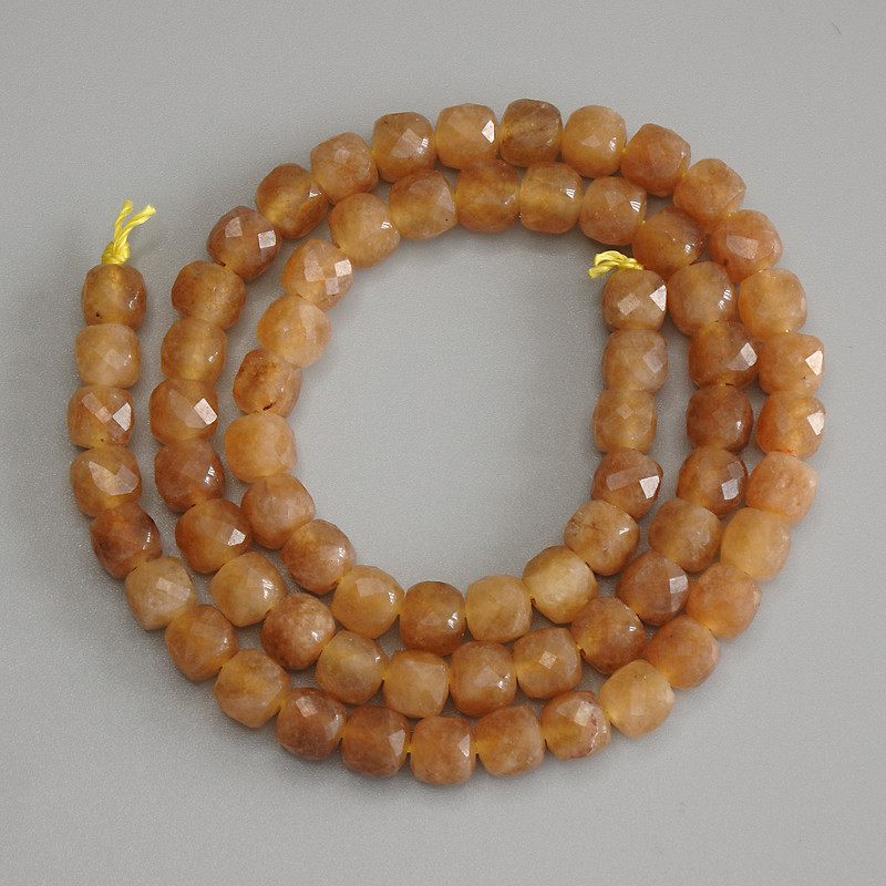 Koraliki cytrynowe fasetowane, sześciany 6 mm ±, na nici, długość 38 cm ±