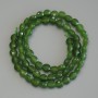 Koraliki z chryzoprazu w formie fasetowanej monety, średnica 6 mm, długość 39 cm na nici