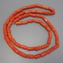 Koraliki z koralu pomarańczowe fasetowane 16–26×11–12 mm, długość około 120 cm, na żyłce