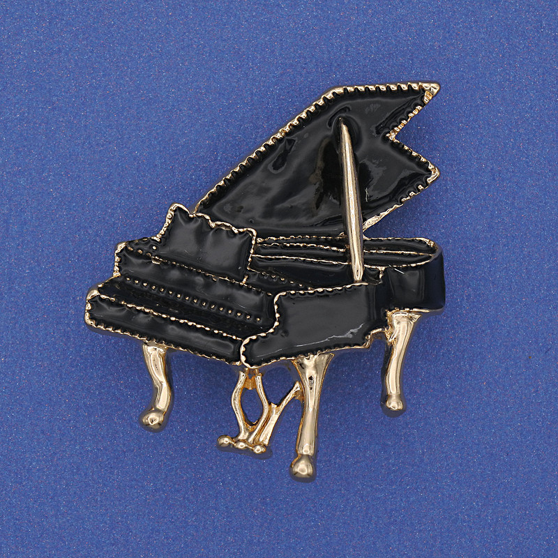 Broszka «Pianano» czarna emalia, złocisty metal 36×30 mm+