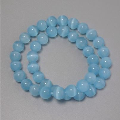 Koraliki Kocie Oko niebieskie syntetyczne kamienie gładka kulka, średnica 10 mm+-na żyłce, długość 37 cm+