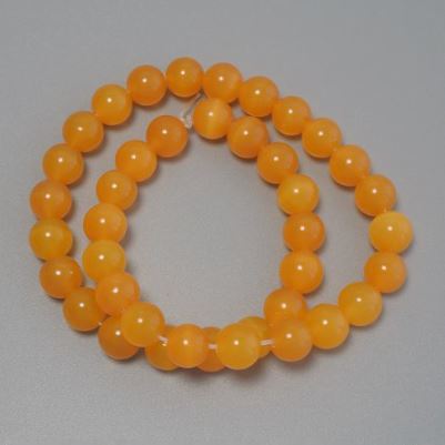 Pomarańczowe koraliki kocie oko 10 mm